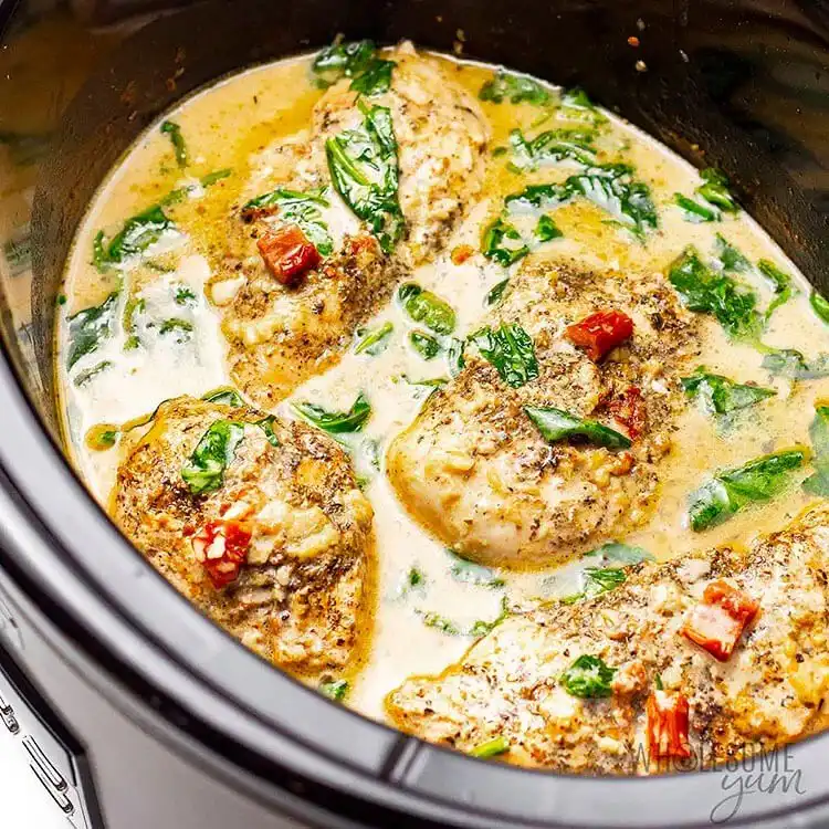 Creamy Crockpot Chicken Tuscan style, featuring sun-dried tomatoes, spinach, and a luscious sauce, a healthy Crockpot Chicken Nachos Recipe - Perfect Dinner Idea.
