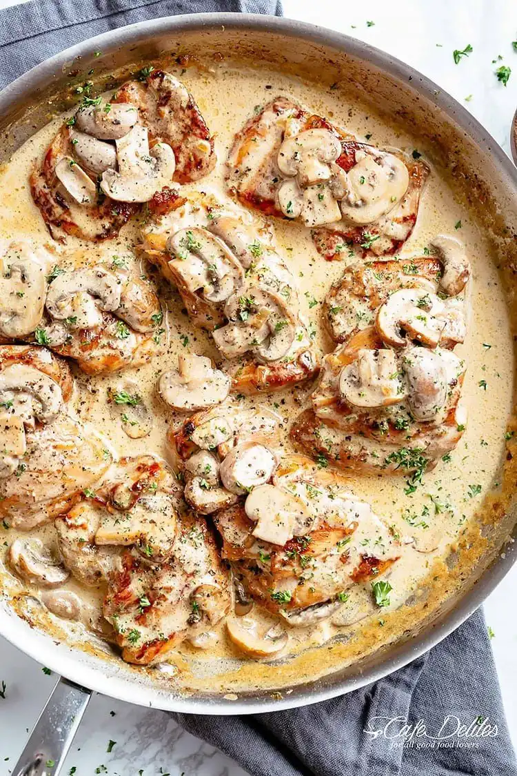 Chicken Thighs With Creamy Mushroom Garlic Sauce, rich with herbs and Parmesan, an elegant Crockpot Chicken Nachos Recipe - Perfect Dinner Idea.
