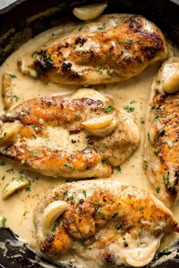 Creamy Garlic Chicken, a hearty comfort food served with rice, making it a perfect Crockpot Chicken Nachos Recipe - Perfect Dinner Idea.