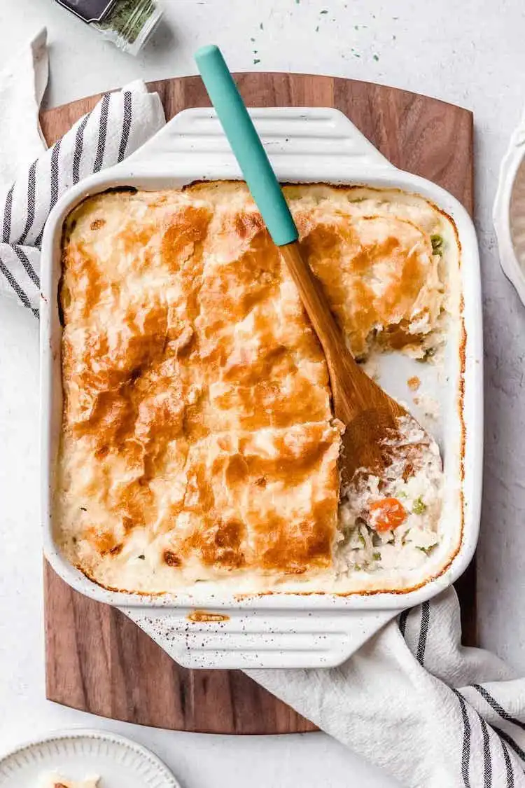 Creamy Chicken Pot Pie with Puff Pastry, showcasing a beautiful golden, flaky topping, a gourmet take on a classic Crockpot Chicken Nachos Recipe - Perfect Dinner Idea.