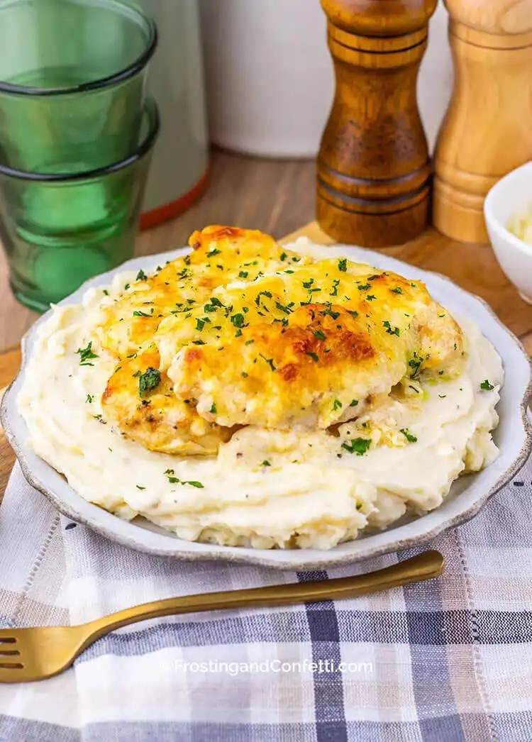 Creamy Chicken Caesar Bake, with a cheesy topping and rich Caesar-flavored sauce, another great Crockpot Chicken Nachos Recipe - Perfect Dinner Idea.