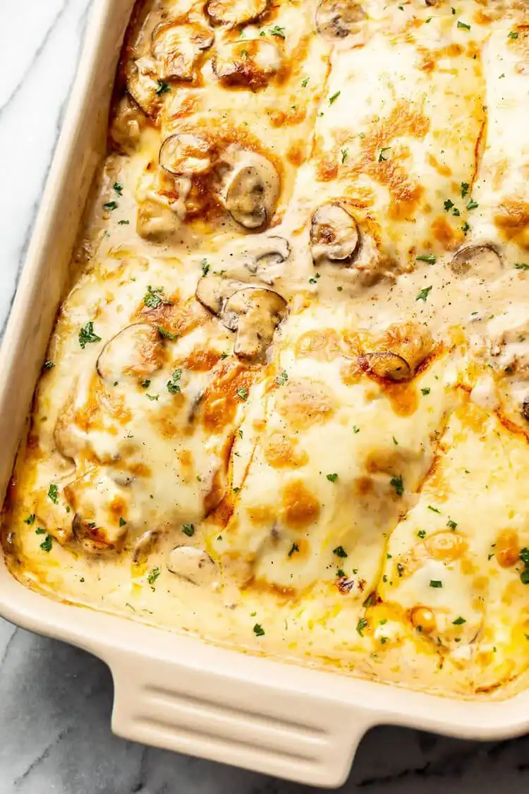 Homemade Chicken Gloria casserole, rich with mushrooms, cream, and melty cheese, an indulgent Crockpot Chicken Nachos Recipe - Perfect Dinner Idea.