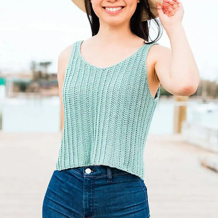 Trendy Timmy Top, a short-sleeved crochet crop top ideal for summer style with mom jeans.