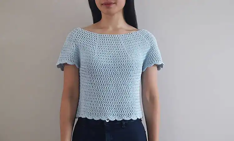 The Buttercup Top, a versatile crochet design that works as an everyday top or swimsuit cover-up for summer.