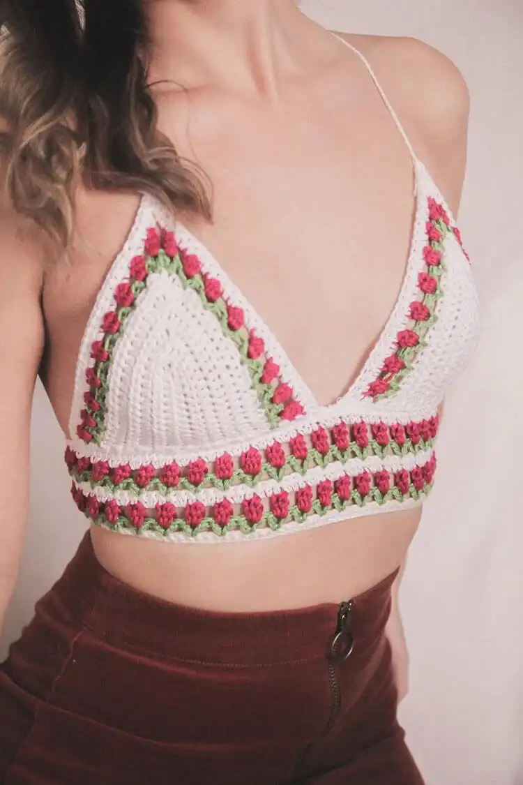 Forget-Me-Not Top with its distinctive boxy fit, boat neck, and scallop edging, showcasing a cute crochet top for summer.