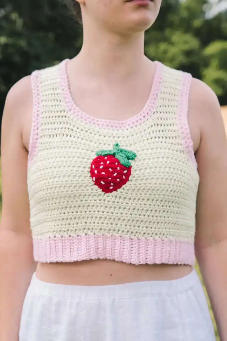 Model wearing the Luna Crop Top, a stylish crochet design made with bamboo yarn for hot summer weather.