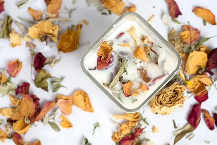 Elegant Dried Flower Candle with embedded colorful petals and herbs, a beautiful DIY craft
