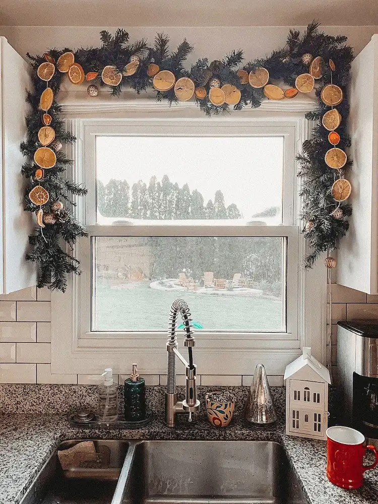 Simple and elegant Beautiful Dried Orange Garland ideas for the holidays, strung with twine against a rustic background.