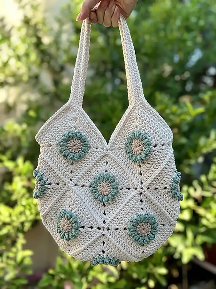 Easy Crochet Flower Bag Pattern 16 Vibrant Flower Granny Square Tote crochet, assembled from multiple floral squares.