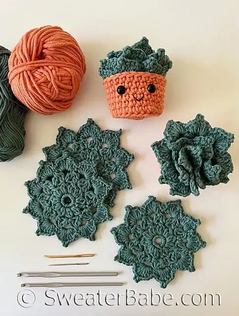 Four festive Turkey Coasters, each crocheted with colorful feathers and smiling faces, arranged on a white surface for Thanksgiving decor.