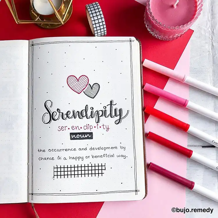 Elegant bullet journal cover page featuring the word 'Serendipity' in script with delicate decorative elements.