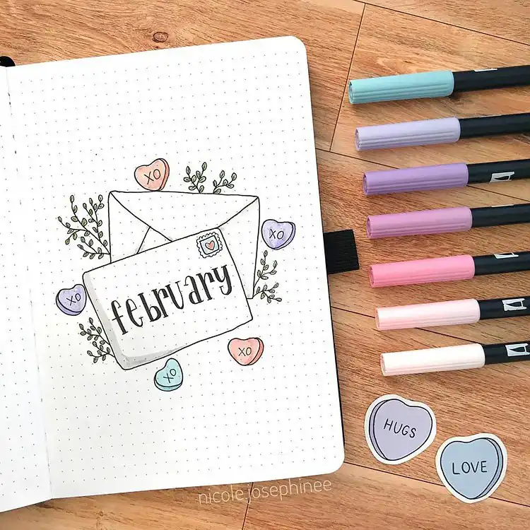 Stunning bullet journal cover page featuring a large, intricately drawn gem-like heart with elegant script.