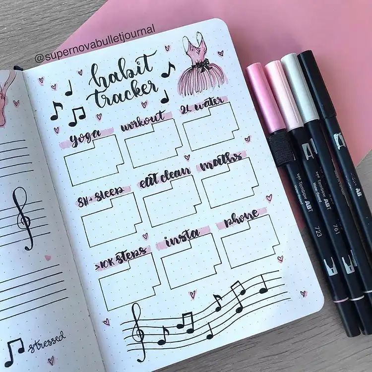 Valentine's Day themed bullet journal cover page with envelopes adorned with 'XO' and heart symbols.