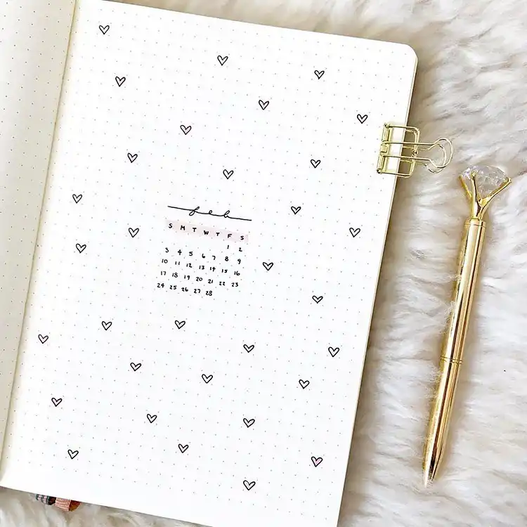 February habit tracker page in a bullet journal, designed with sections for daily and weekly tracking.