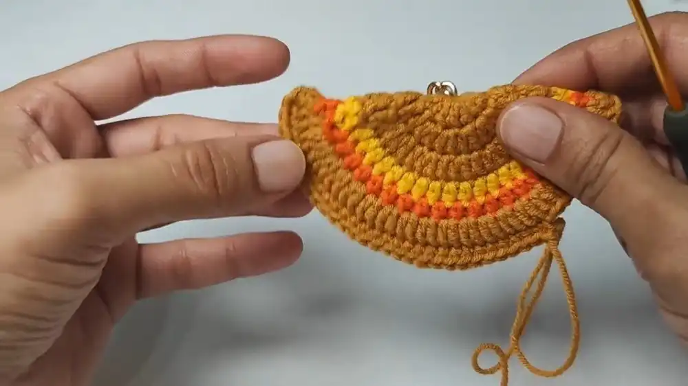 Step-by-step visual for crocheting the main body of the Free Crochet Rooster Keychain Pattern, showing circular rounds and stuffing.