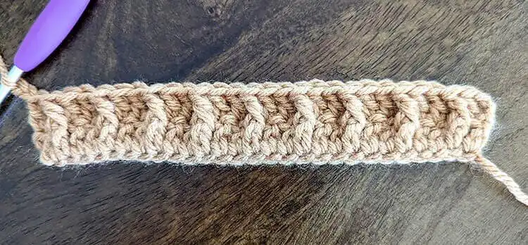 First row of double crochet stitches completed for the Free Crochet Waffle Kindle Case Pattern panel.