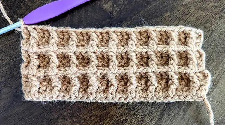 Six rows of the waffle stitch pattern completed, showing the developing texture for the Free Crochet Waffle Kindle Case Pattern.