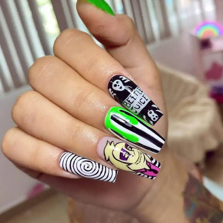 Exquisite hand-painted Glow in the Dark Beetlejuice Nails with detailed portraits of characters and movie scenes.