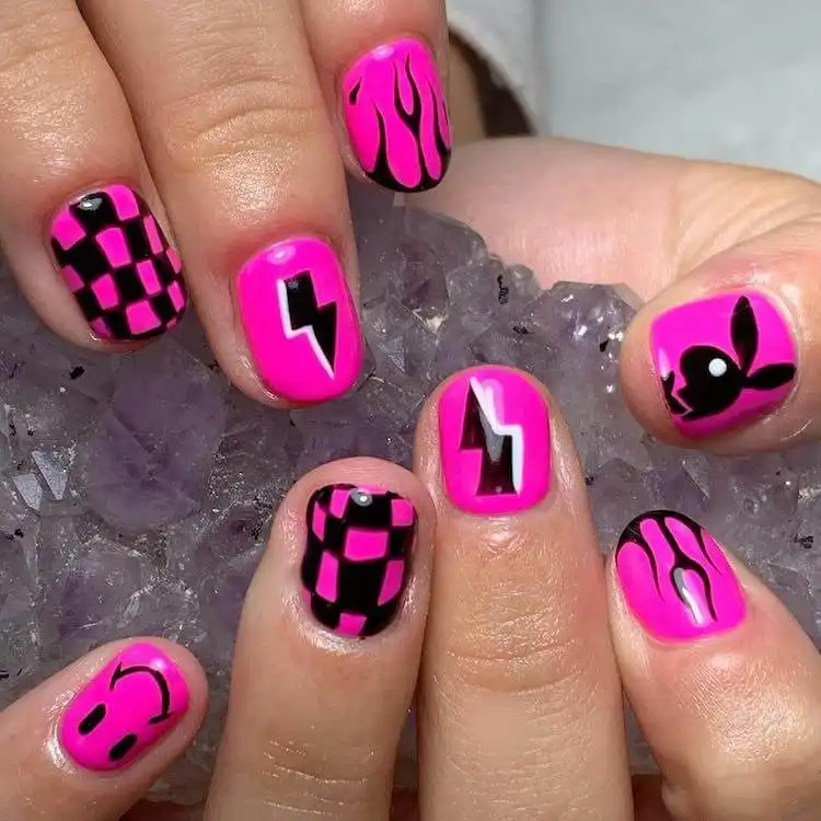 Goth and Emo Nail Designs with Nail Chart 2 Pink and black emo nails with hand-painted checkerboard, flame, and doodle art on various nail shapes