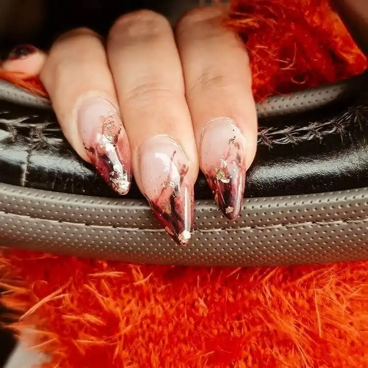 Goth and Emo Nail Designs with Nail Chart 17 Gothic gel nails in deep, rich colors like black or dark purple, demonstrating durable and vibrant gel polish finish