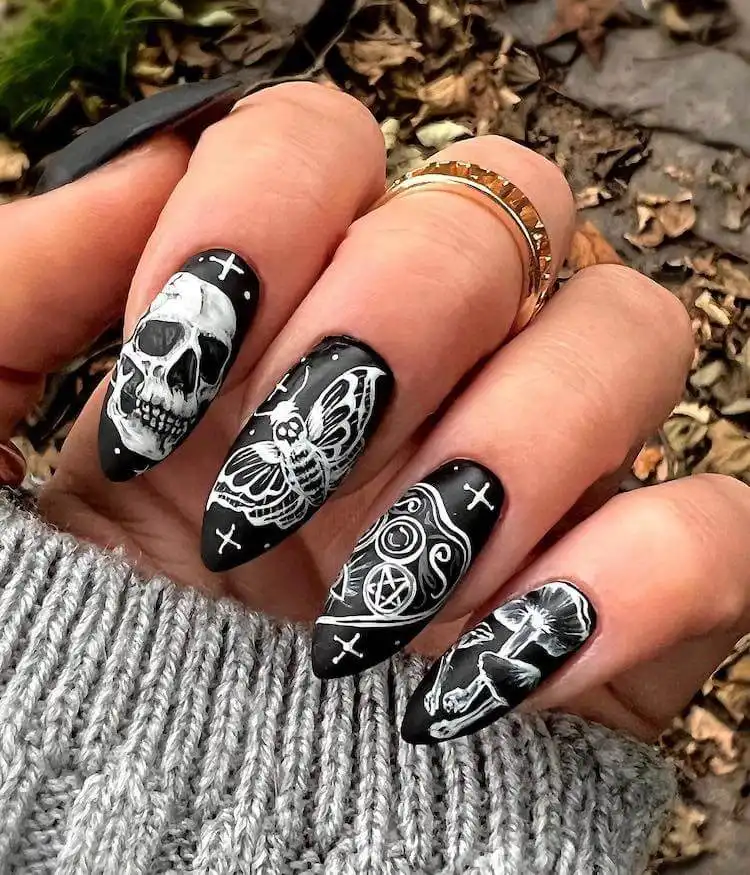Goth and Emo Nail Designs with Nail Chart 3 Elegant black ombre stiletto nails with subtle fading and small black dot accents on medium length