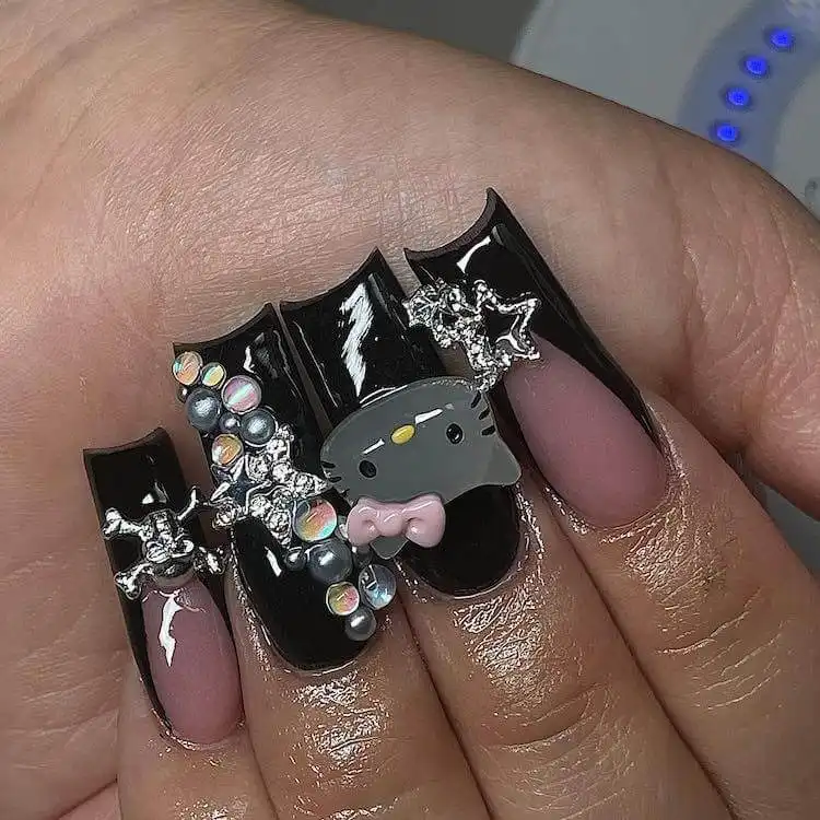 Goth and Emo Nail Designs with Nail Chart 6 Black hearts and flames nail design on a clear or neutral base, suitable for everyday goth or emo wear