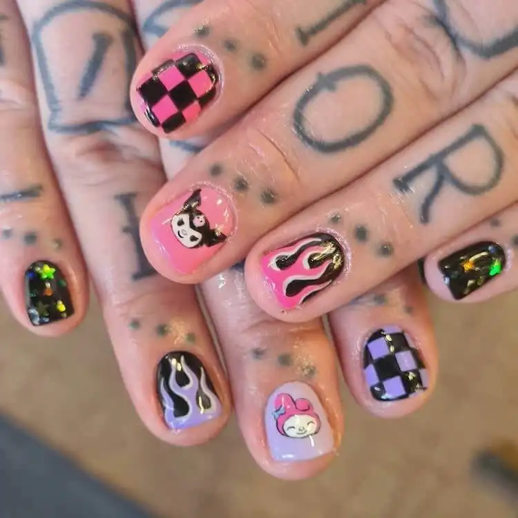 Goth and Emo Nail Designs with Nail Chart 8 Black and pink French tip nails, combining a dark base with vibrant pink tips for an edgy twist