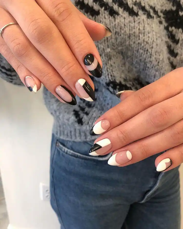 Green and White Almond Shaped Nail Design for Women - Great for Fall, Summer and Holidays 1 Creative black and white negative space almond nails for women, a modern and chic design