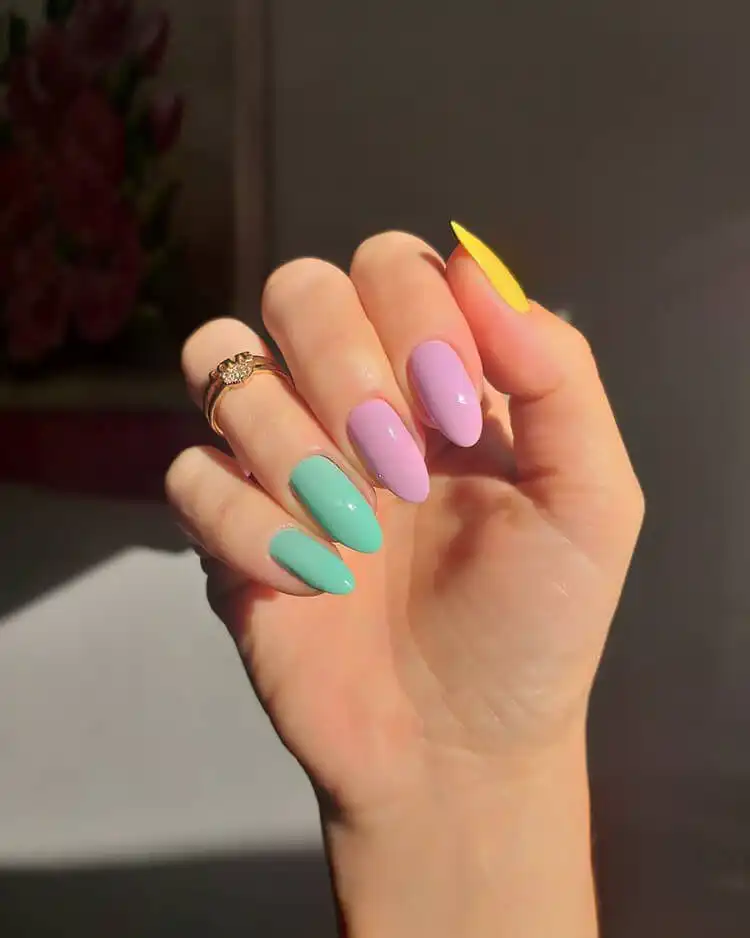Green and White Almond Shaped Nail Design for Women - Great for Fall, Summer and Holidays 15 Beautiful vibrant pastel almond nails for women, showcasing simplicity and lovely colors
