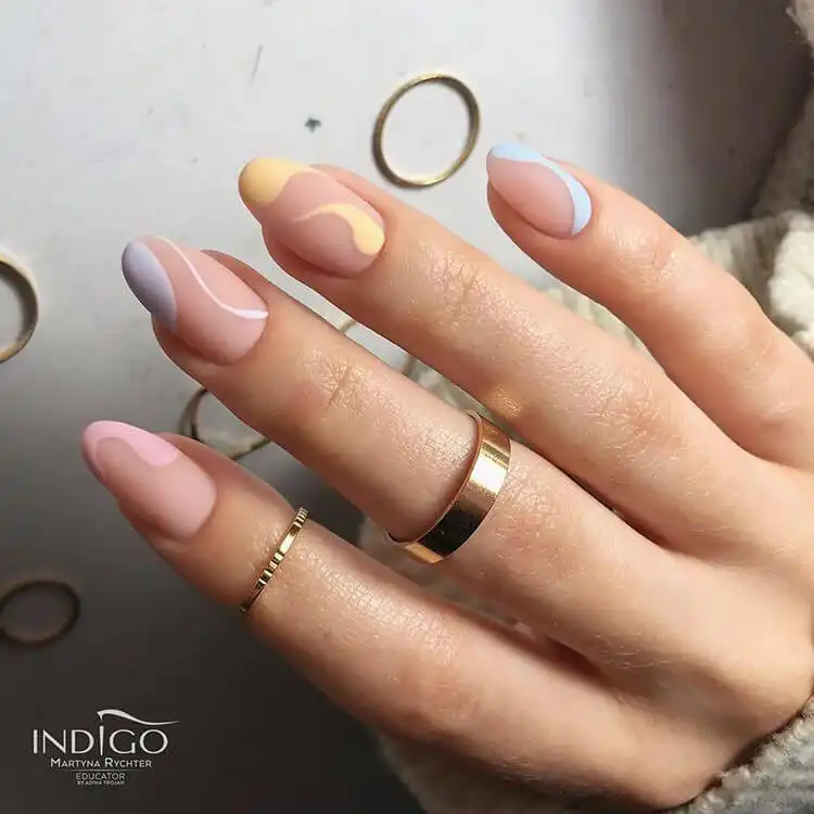 Green and White Almond Shaped Nail Design for Women - Great for Fall, Summer and Holidays 17 Matte pastel almond nails for women, a stylish twist on the wavy design trend