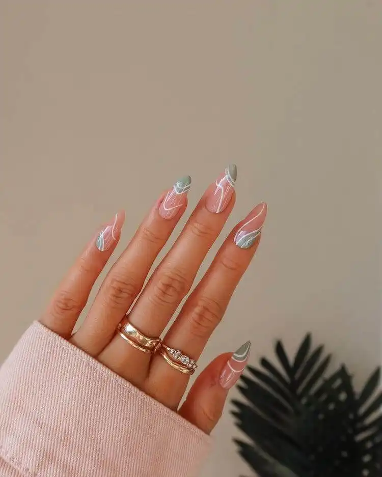 Green and White Almond Shaped Nail Design for Women - Great for Fall, Summer and Holidays 8 Green and White Almond Shaped Nail Design for Women featuring a fun, unique swirl – great for fall, summer, and holidays