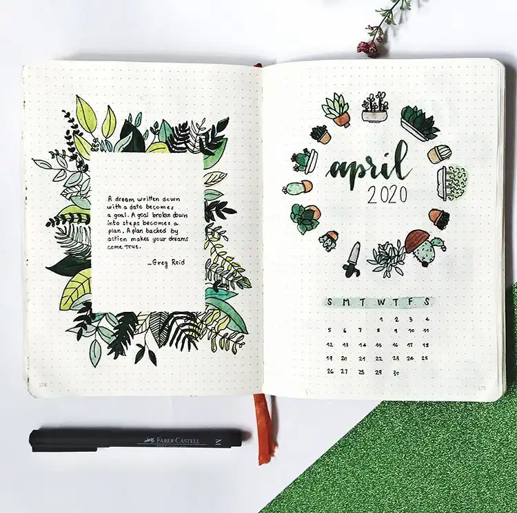May bullet journal cover page with elegant calligraphy for 'May' surrounded by various hand-drawn green cacti and succulents.