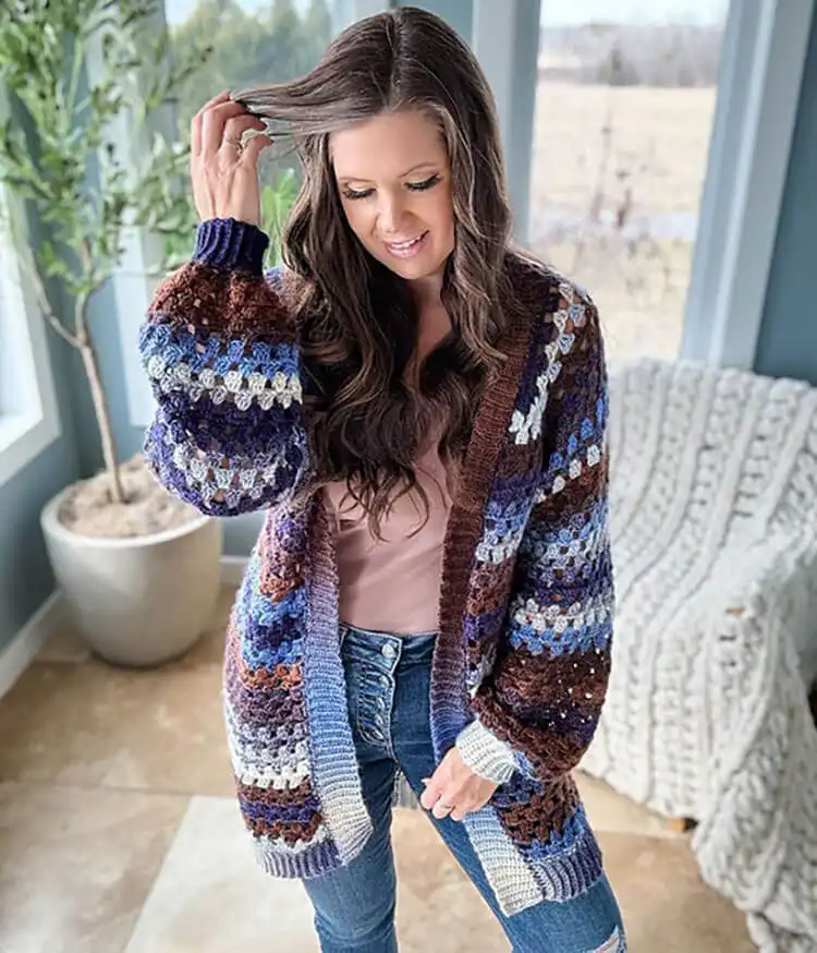 Seamless top-down raglan Granny Pop Cardigan featuring granny stitch clusters in varied sizes