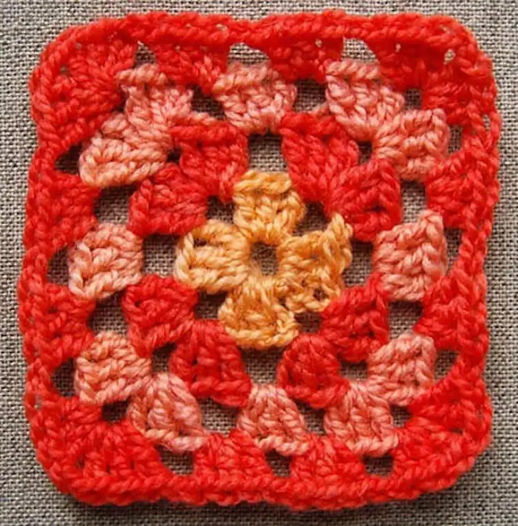 Close-up of a perfectly executed Classic Granny Square, showcasing traditional stitches