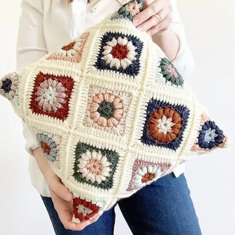 Textured Astrid Pillow granny square design, featuring prominent puff stitches