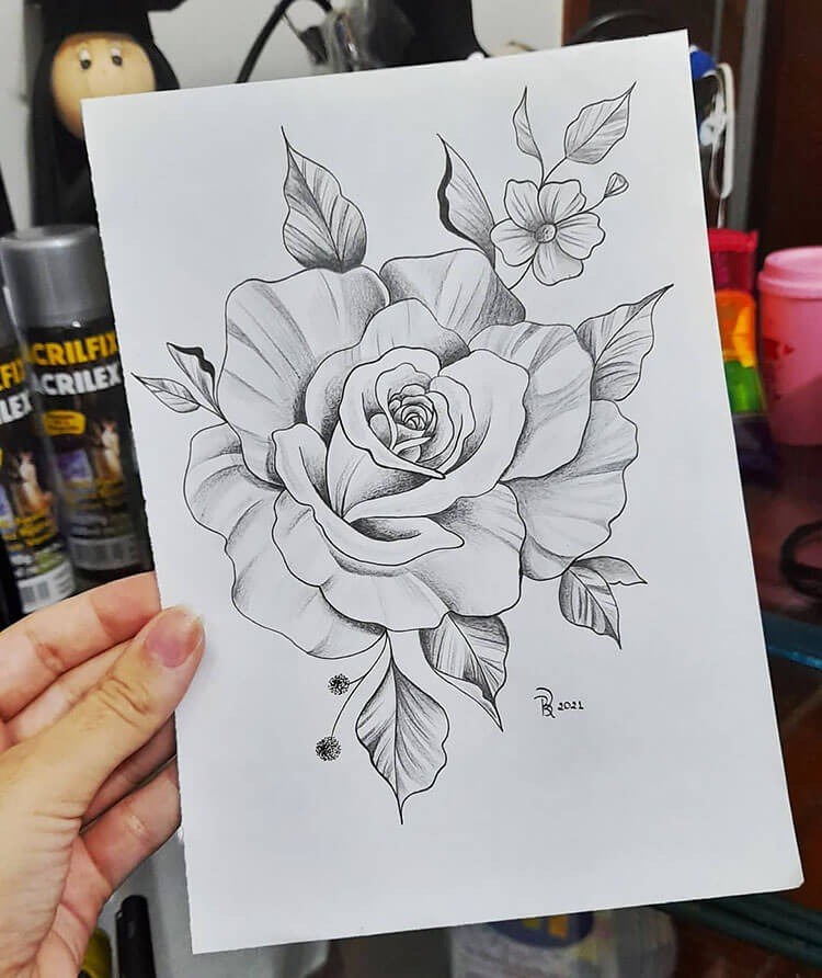 A rose drawing featuring a stem and leaves, demonstrating the overall composition of the flower.