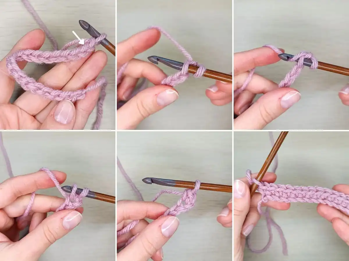 A beginner's crochet project showing a foundation chain and the start of the first row of single crochet stitches.