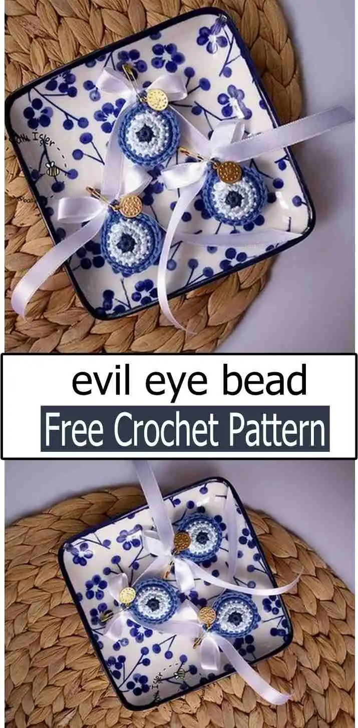 An intricate crocheted Evil Eye Bead made with sport weight yarn and a small hook, perfect for jewelry.