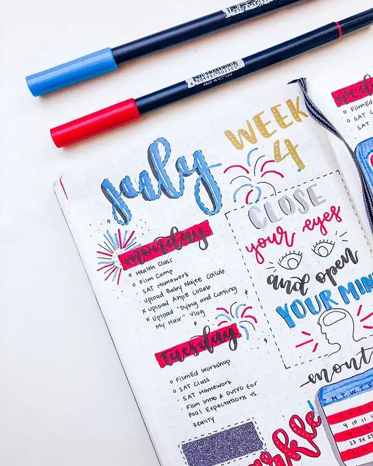 July Bullet Journal Cover Page Ideas 19 Fireworks and an inspiring quote on a July weekly planner spread.