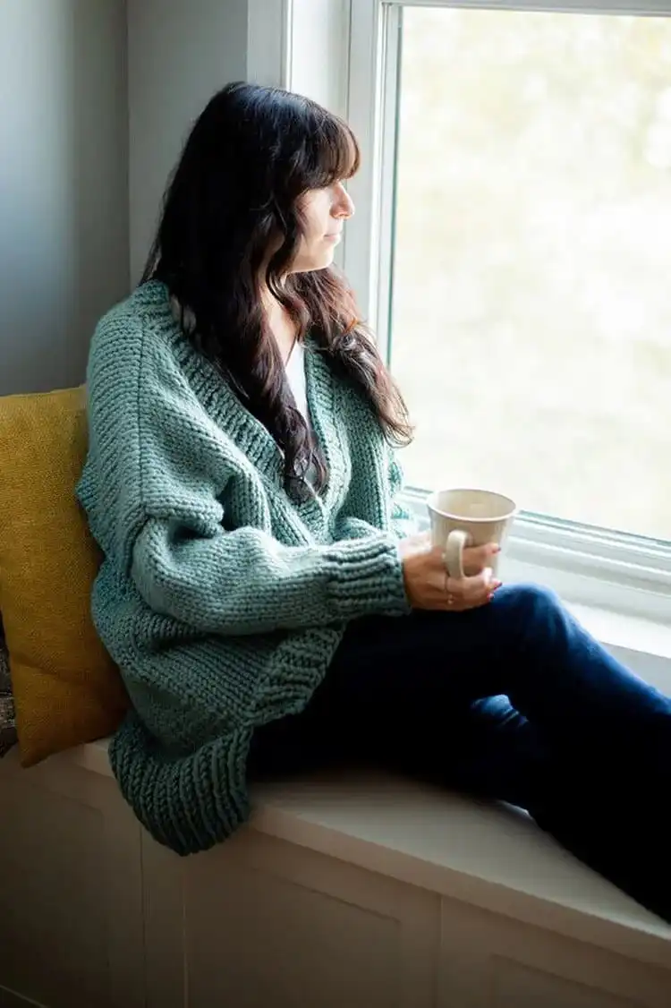 Oversized and cozy Back to Basics Knit Cardigan made with super bulky yarn, perfect for beginners.