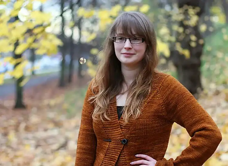 Warm-toned Harvest Cardigan, ideal for autumn wear, showcasing cozy knit details.