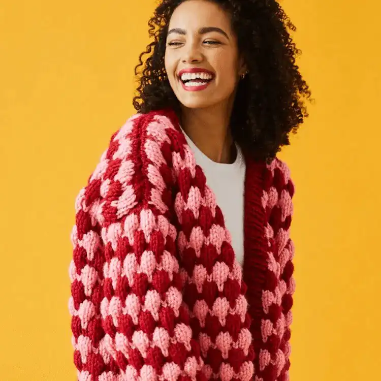 Playful Bubble Stitch Cardigan with unique textured bobbles, standing out from the crowd.
