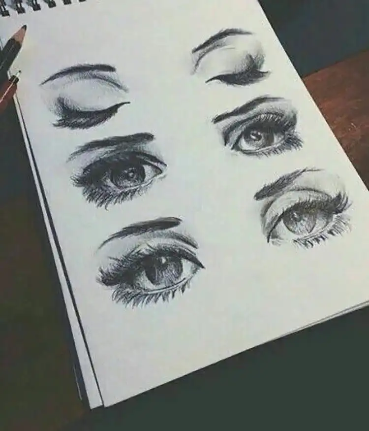 Detailed eye drawing with step-by-step instructions, guiding through each stage of the artistic process.