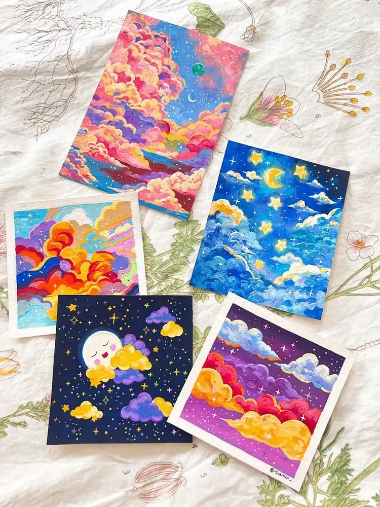 A charming gouache sky painting with soft colors and stylized clouds, showcasing the medium's versatility for creating cute and expressive art, like learning how to paint a gouache flower.