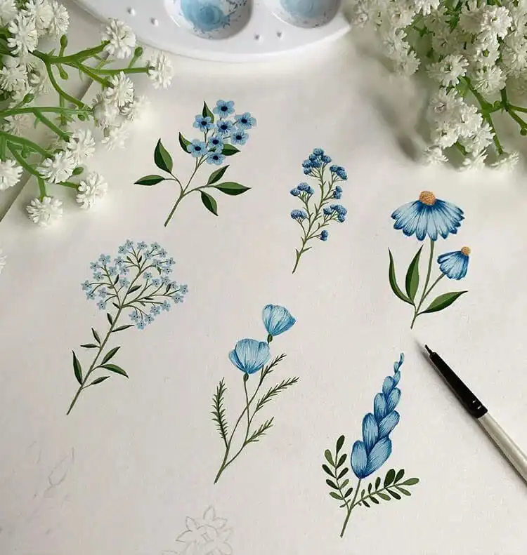 Detail of blue flowers rendered in gouache, highlighting the paint's ability to create crisp edges and solid color blocks, ideal for learning how to paint a gouache flower.