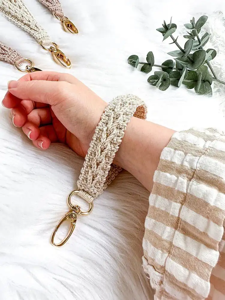 A versatile 3-in-1 crochet keychain, featuring wristlet, tassel, and simple loop styles in complementary colors.