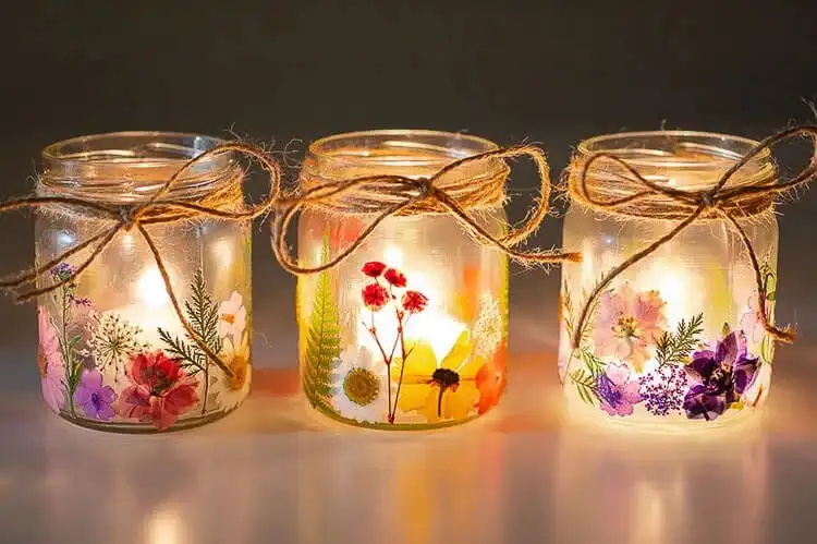 Make Your Own Lantern with These DIY Ideas 3 Beautiful Pressed Flower Lanterns made with real dried flowers, creating a serene, botanical lighting effect.
