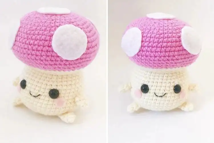 A small, chubby pink-capped Kinoko mushroom amigurumi, a cute desk companion from the free crochet patterns.