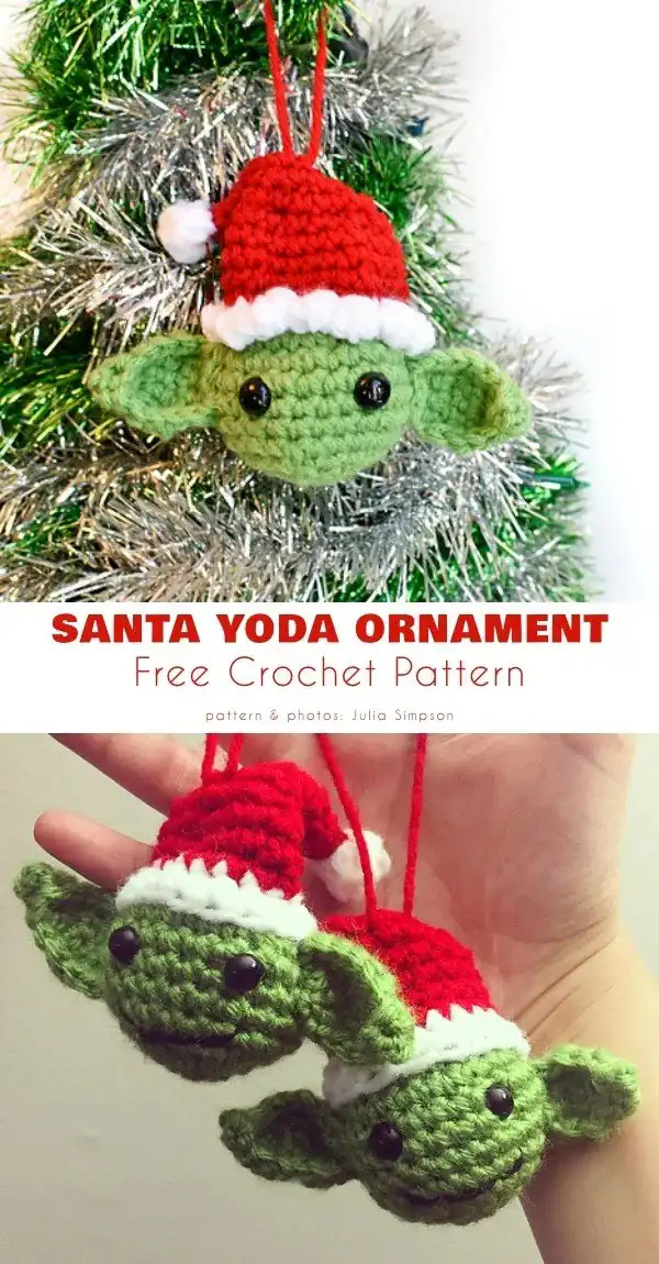 Crocheted Santa Yoda ornament wearing a red Santa hat, hanging on a Christmas tree branch.
