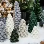 Green crochet Christmas tree made with shell stitches, creating a beautiful textured and ruffled appearance.